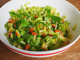 Shredded Brussels sprouts with toasted almonds, lemon  and chilli